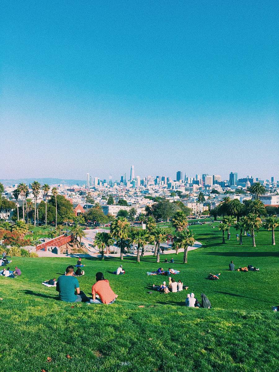 san francisco people resting on green grass park ca 94114